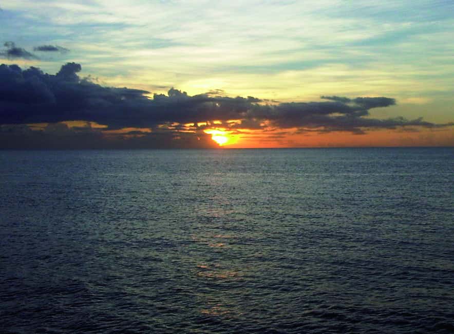 Romantic Caribbean Sunset Cruise - Boarding the Catamaran: Drinks, Music, and Crew Energy