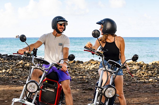 St.Lucia Beaches and Backroads Tour by Electric Big-Wheel Scooter - Reduit Beach Stop: Your First Taste of St. Lucia’s Shoreline